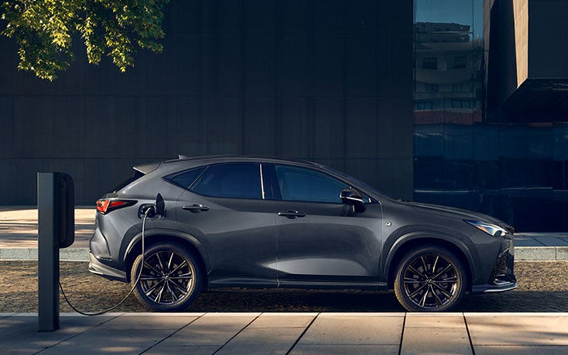 Exterior of the Lexus NX Plug-in Hybrid Electric Vehicle shown in Cloudburst Gray.